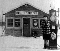 Dale & Leoras store in Onaway, Ruth out front.